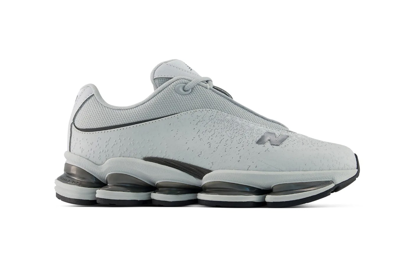 New Balance Unveils the Avant-Garde 2000 Sleek Silhouette grey black colorways two