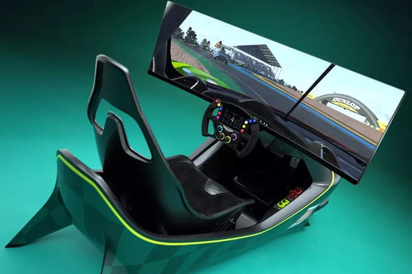 Aston Martin AMR-C01-R Hypercar Edition simulator in Podium Green Valkyrie-inspired livery with curved Samsung Odyssey display and carbon-fiber monocoque