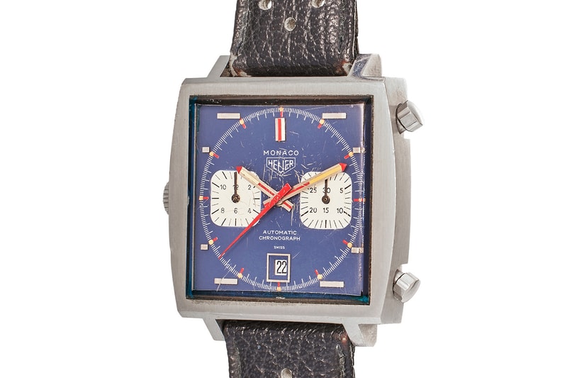 Heuer Monaco 1133B Steve McQueen Le Mans watch with blue dial and square stainless steel case displayed for Sotheby’s auction