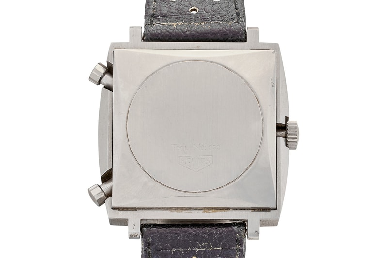 Heuer Monaco 1133B Steve McQueen Le Mans watch with blue dial and square stainless steel case displayed for Sotheby’s auction