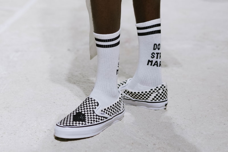 DSM Kei Ninomiya x Vans Slip-On collaboration with custom floral overlays and branded details - detail view 3