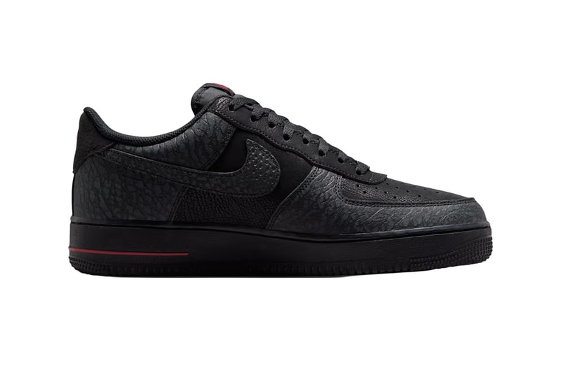 Nike Air Force 1 Low 'What The' displaying tumbled leather, elephant print, and safari texture across black upper with Tough Red accents - detail view 4