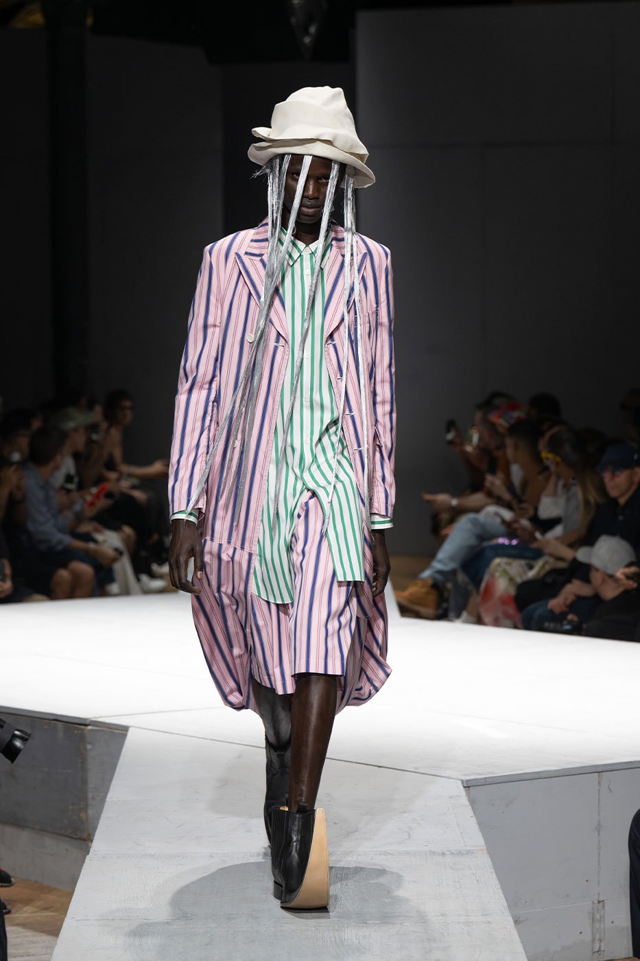 COMME des GARÇONS HOMME PLUS SS27 Debuts Dual-Act Show "If The War Were To End.." rei kawakubo paris fashion week