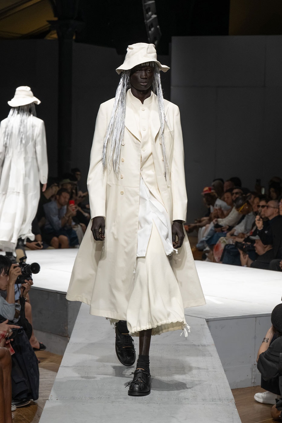COMME des GARÇONS HOMME PLUS SS27 Debuts Dual-Act Show "If The War Were To End.." rei kawakubo paris fashion week