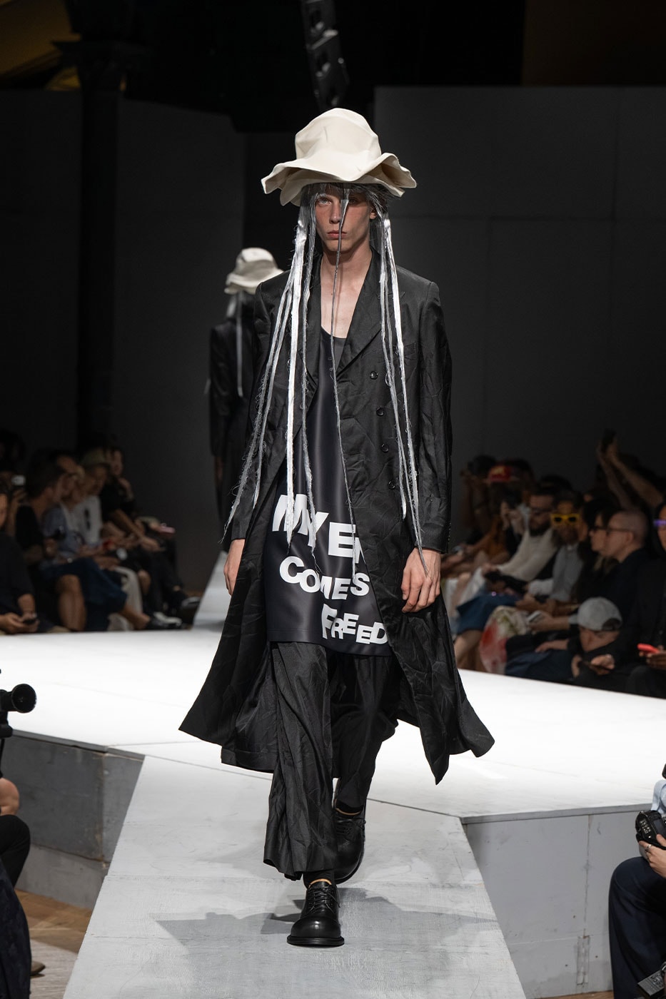COMME des GARÇONS HOMME PLUS SS27 Debuts Dual-Act Show "If The War Were To End.." rei kawakubo paris fashion week