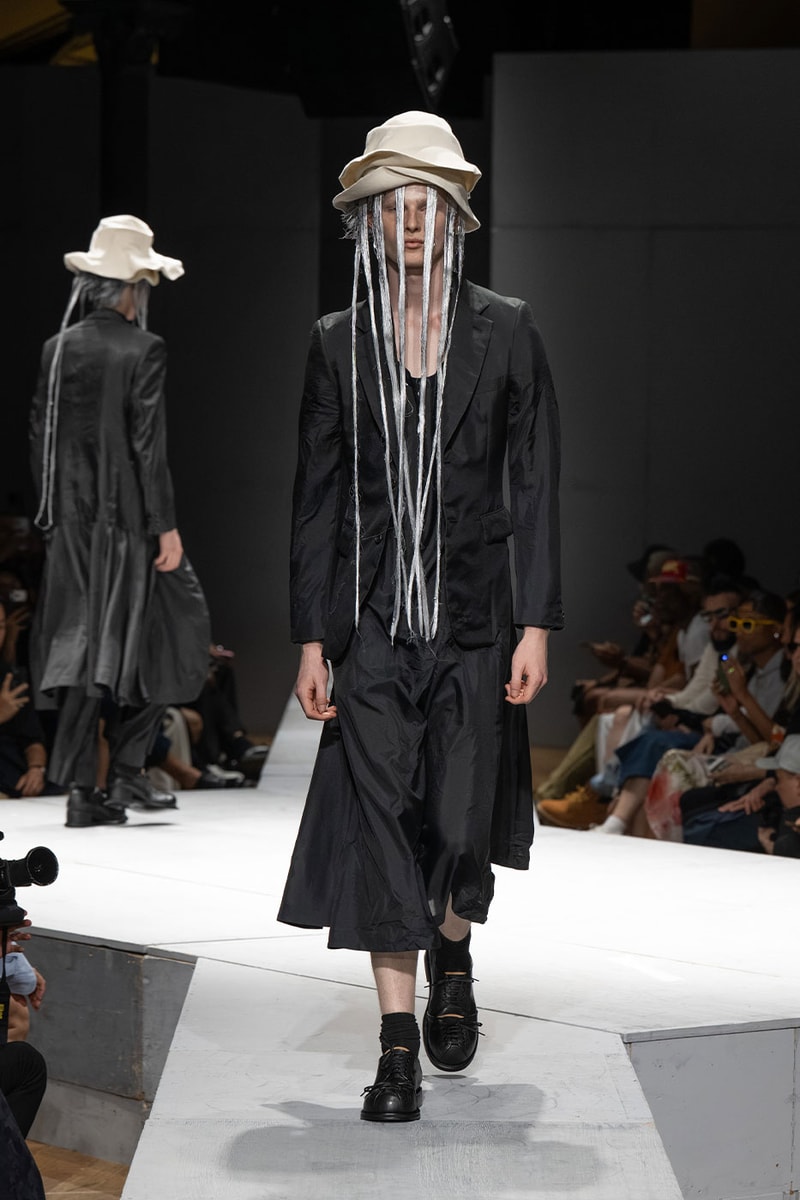 COMME des GARÇONS HOMME PLUS SS27 Debuts Dual-Act Show "If The War Were To End.." rei kawakubo paris fashion week