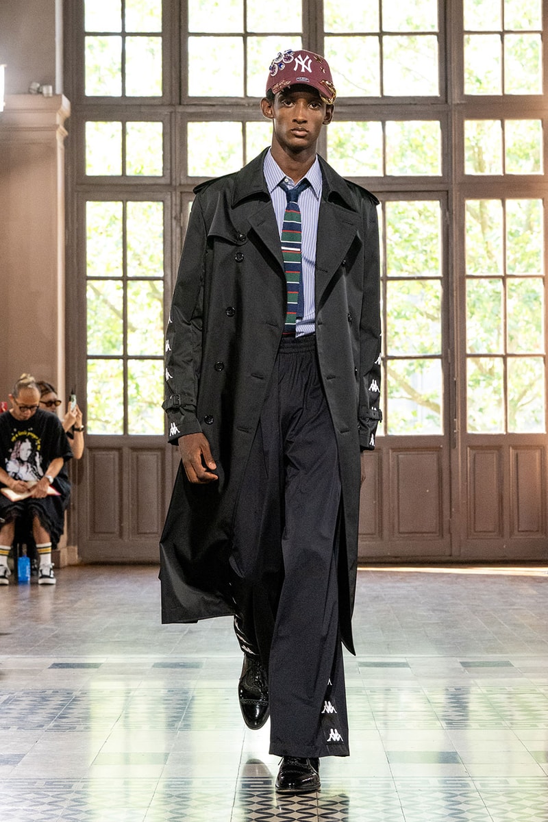 JUNYA WATANABE MAN SS27 Blends Streetwear Icons and Luxury Tailoring Under "BLING BLING BLING" Theme paris fashion week spring summer 2027 runway Kappa  Needles  Carhartt  Levi’s  Luigi Borrelli  Guy Rover  Maria Santangelo  INNERRAUM  47  HIDDEN   Union LA  DHL  Flake  New Balance  Heinrich Dinkelacker  Tricker's 