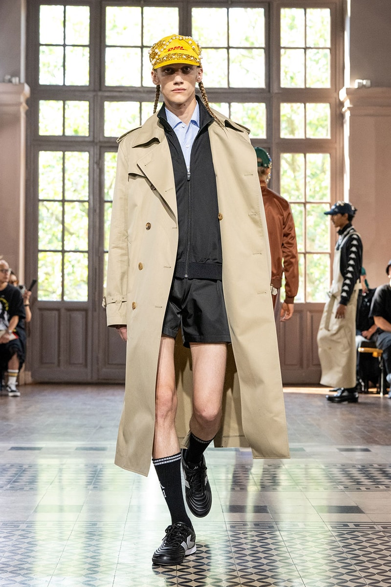JUNYA WATANABE MAN SS27 Blends Streetwear Icons and Luxury Tailoring Under "BLING BLING BLING" Theme paris fashion week spring summer 2027 runway Kappa  Needles  Carhartt  Levi’s  Luigi Borrelli  Guy Rover  Maria Santangelo  INNERRAUM  47  HIDDEN   Union LA  DHL  Flake  New Balance  Heinrich Dinkelacker  Tricker's 