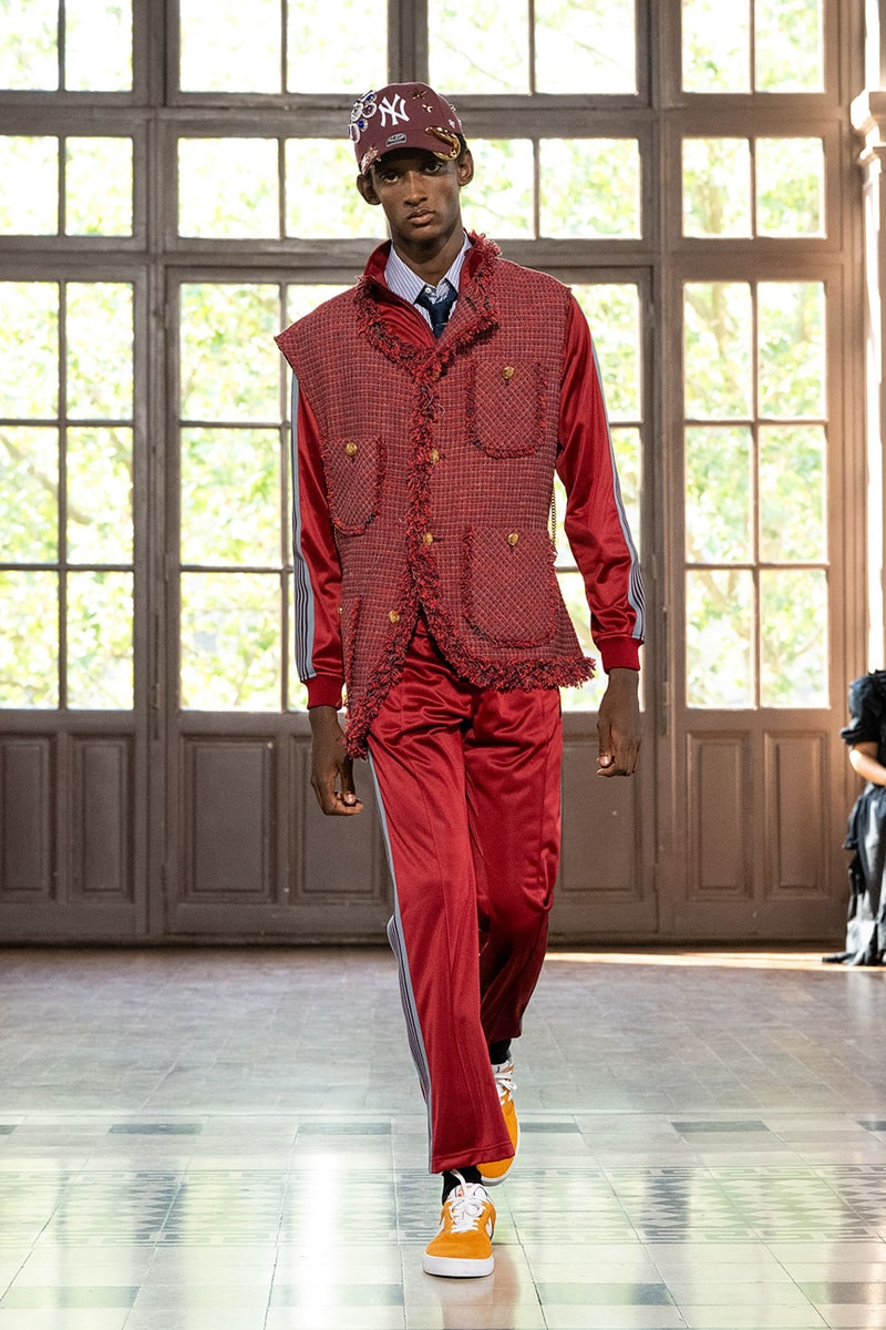 JUNYA WATANABE MAN SS27 Blends Streetwear Icons and Luxury Tailoring Under "BLING BLING BLING" Theme paris fashion week spring summer 2027 runway Kappa  Needles  Carhartt  Levi’s  Luigi Borrelli  Guy Rover  Maria Santangelo  INNERRAUM  47  HIDDEN   Union LA  DHL  Flake  New Balance  Heinrich Dinkelacker  Tricker's 