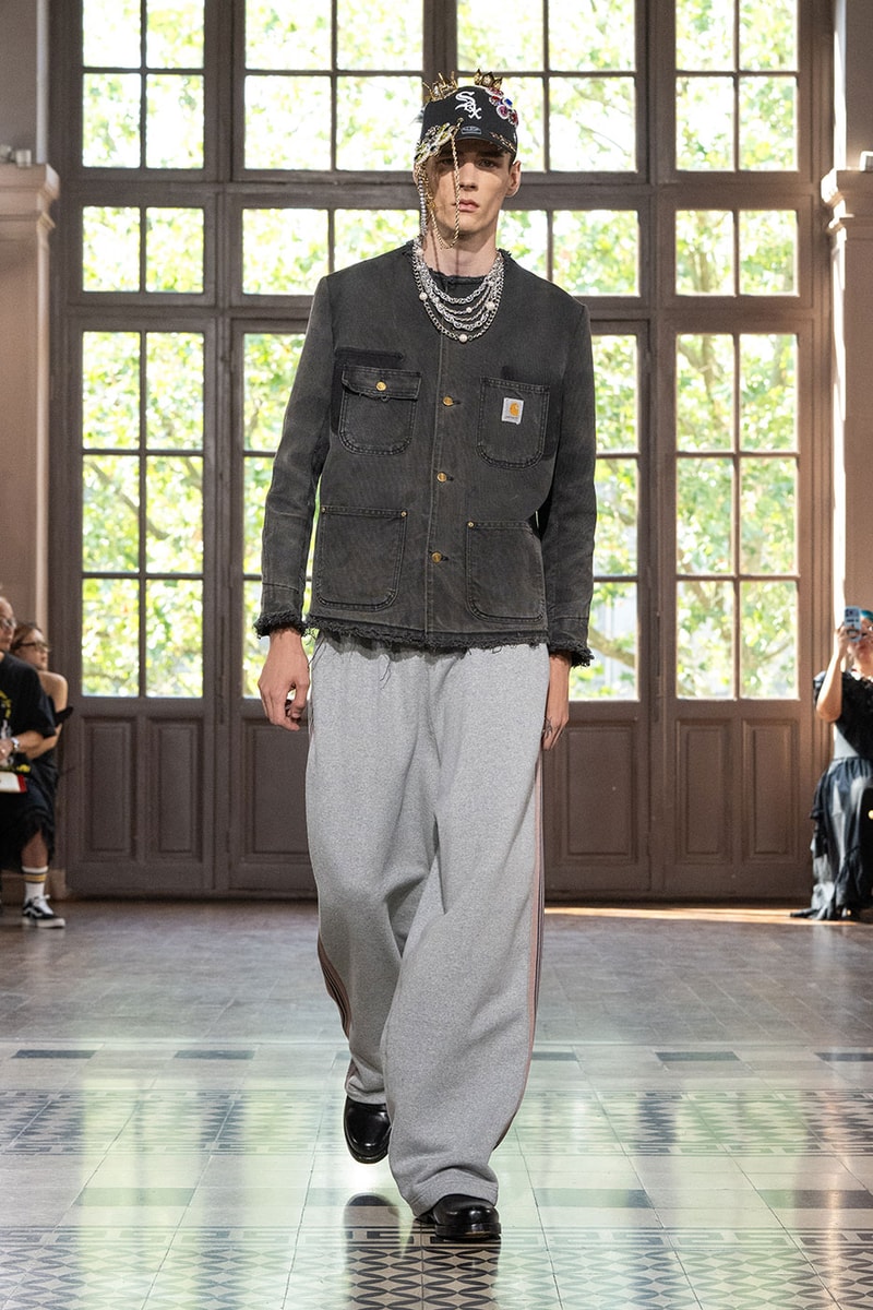 JUNYA WATANABE MAN SS27 Blends Streetwear Icons and Luxury Tailoring Under "BLING BLING BLING" Theme paris fashion week spring summer 2027 runway Kappa  Needles  Carhartt  Levi’s  Luigi Borrelli  Guy Rover  Maria Santangelo  INNERRAUM  47  HIDDEN   Union LA  DHL  Flake  New Balance  Heinrich Dinkelacker  Tricker's 