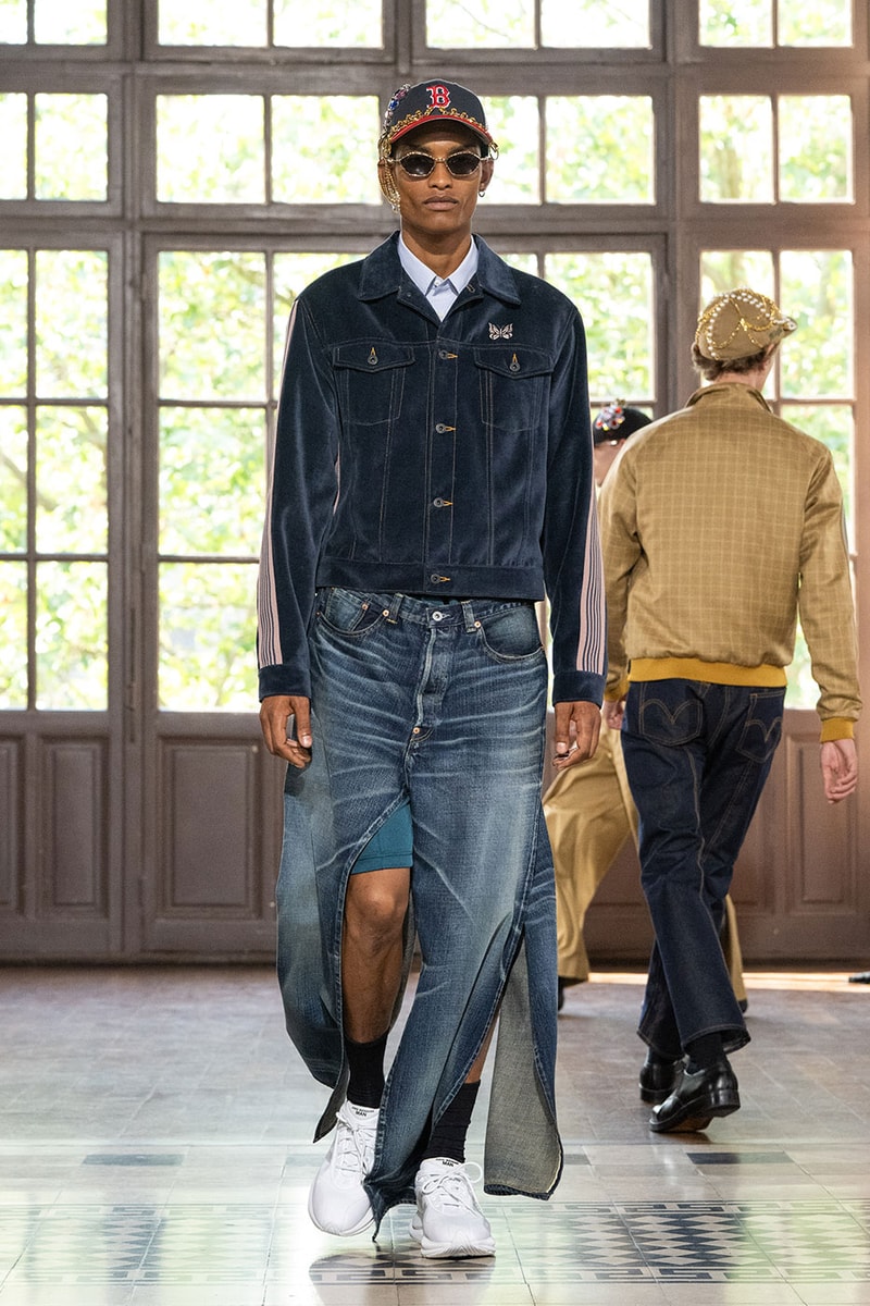 JUNYA WATANABE MAN SS27 Blends Streetwear Icons and Luxury Tailoring Under "BLING BLING BLING" Theme paris fashion week spring summer 2027 runway Kappa  Needles  Carhartt  Levi’s  Luigi Borrelli  Guy Rover  Maria Santangelo  INNERRAUM  47  HIDDEN   Union LA  DHL  Flake  New Balance  Heinrich Dinkelacker  Tricker's 