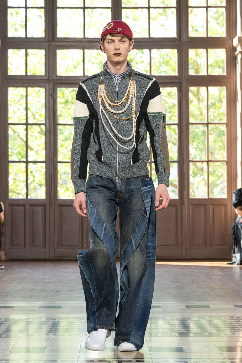 JUNYA WATANABE MAN SS27 Blends Streetwear Icons and Luxury Tailoring Under "BLING BLING BLING" Theme paris fashion week spring summer 2027 runway Kappa  Needles  Carhartt  Levi’s  Luigi Borrelli  Guy Rover  Maria Santangelo  INNERRAUM  47  HIDDEN   Union LA  DHL  Flake  New Balance  Heinrich Dinkelacker  Tricker's 