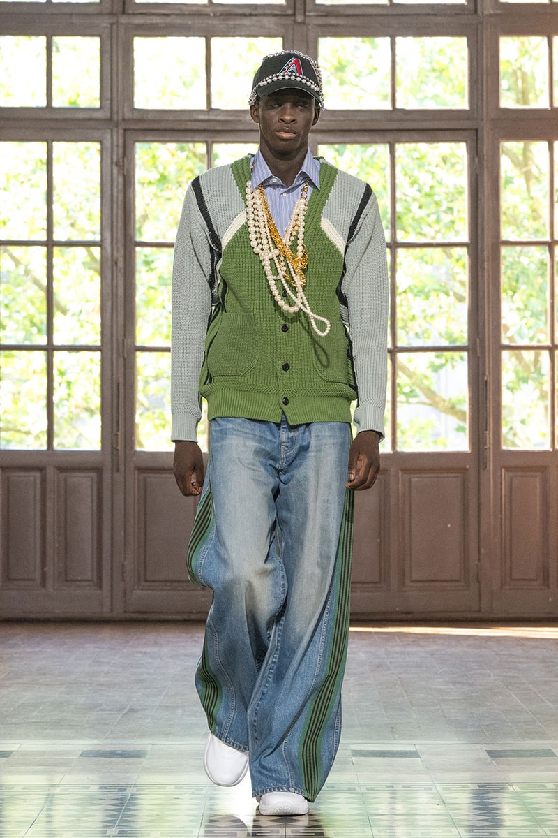 JUNYA WATANABE MAN SS27 Blends Streetwear Icons and Luxury Tailoring Under "BLING BLING BLING" Theme paris fashion week spring summer 2027 runway Kappa  Needles  Carhartt  Levi’s  Luigi Borrelli  Guy Rover  Maria Santangelo  INNERRAUM  47  HIDDEN   Union LA  DHL  Flake  New Balance  Heinrich Dinkelacker  Tricker's 