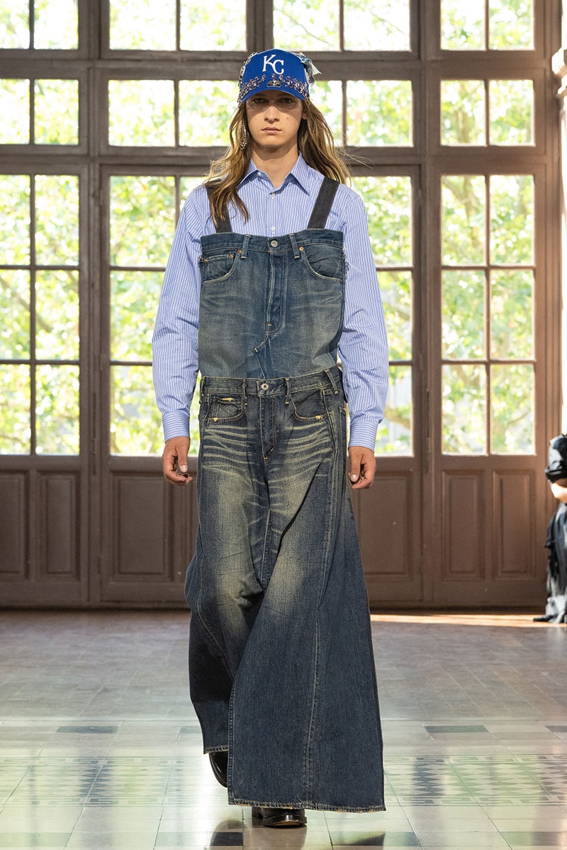 JUNYA WATANABE MAN SS27 Blends Streetwear Icons and Luxury Tailoring Under "BLING BLING BLING" Theme paris fashion week spring summer 2027 runway Kappa  Needles  Carhartt  Levi’s  Luigi Borrelli  Guy Rover  Maria Santangelo  INNERRAUM  47  HIDDEN   Union LA  DHL  Flake  New Balance  Heinrich Dinkelacker  Tricker's 