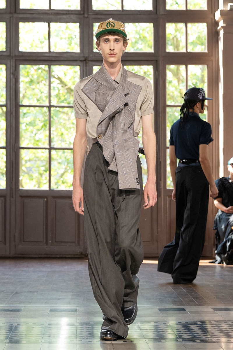 JUNYA WATANABE MAN SS27 Blends Streetwear Icons and Luxury Tailoring Under "BLING BLING BLING" Theme paris fashion week spring summer 2027 runway Kappa  Needles  Carhartt  Levi’s  Luigi Borrelli  Guy Rover  Maria Santangelo  INNERRAUM  47  HIDDEN   Union LA  DHL  Flake  New Balance  Heinrich Dinkelacker  Tricker's 