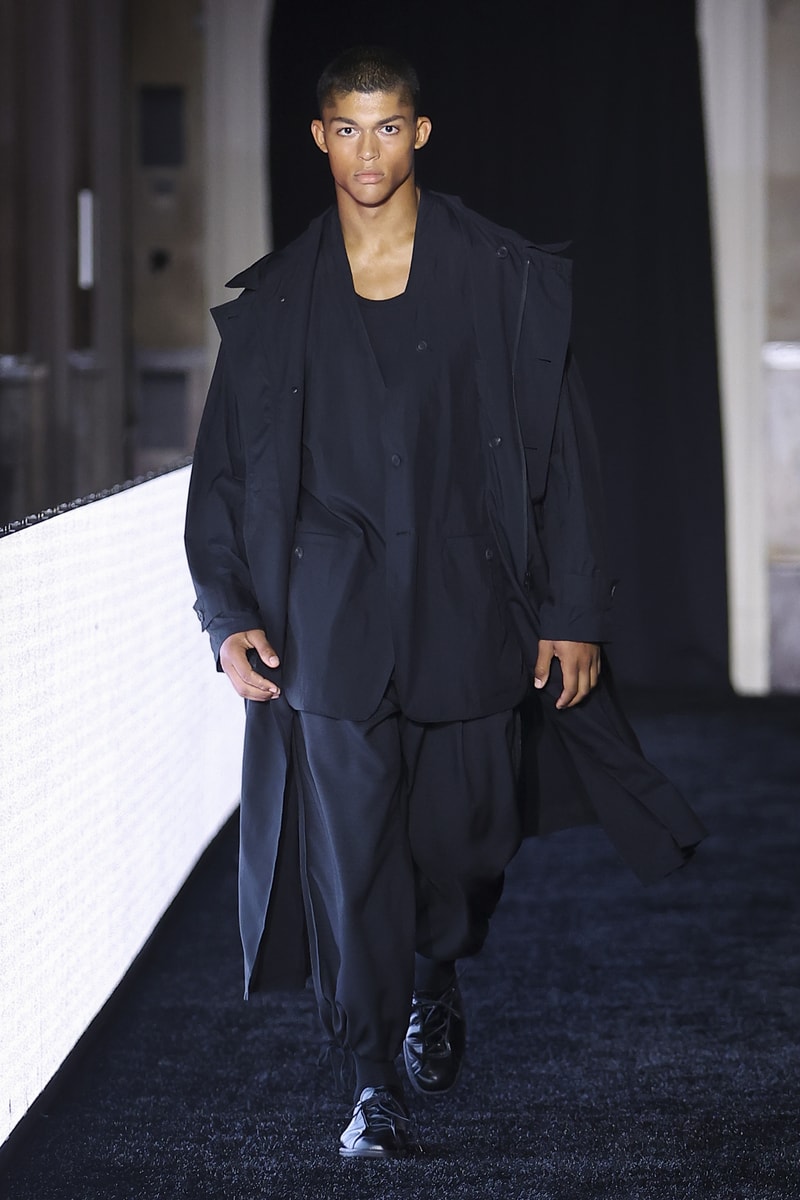 Y-3 SS27 runway presentation at Palais Brongniart featuring deconstructed Stan Smith silhouettes and brutalist football-inspired tailoring - detail view 3