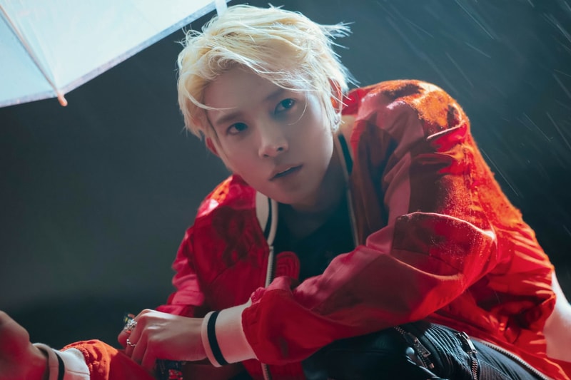EVAN photographed against minimal backdrop, absence of graphic overlays typical of idol announcements