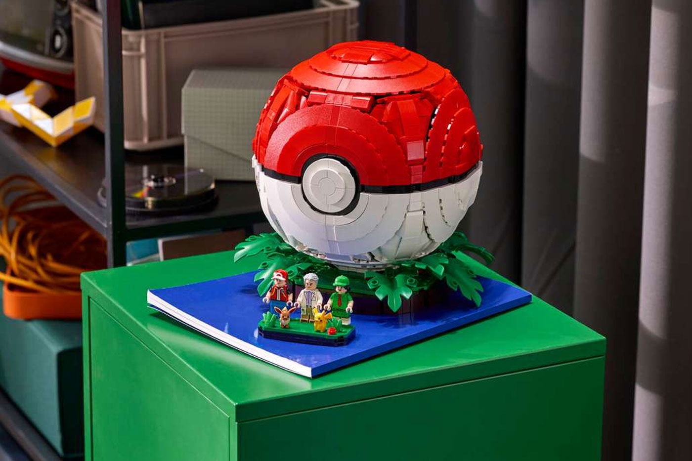 LEGO's "Iconic Trainer Moments" Poké Ball Is a Masterclass in Hidden Brick Construction first-ever human Pokémon minifigures collaboration pokemon professor oak famous laboratory