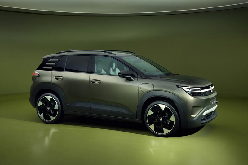 Volkswagen ID. Cross electric SUV on road showcasing compact proportions and clean LED lighting