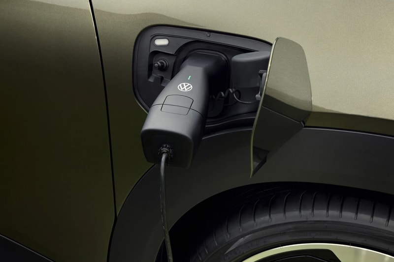 Volkswagen ID. Cross electric SUV on road showcasing compact proportions and clean LED lighting