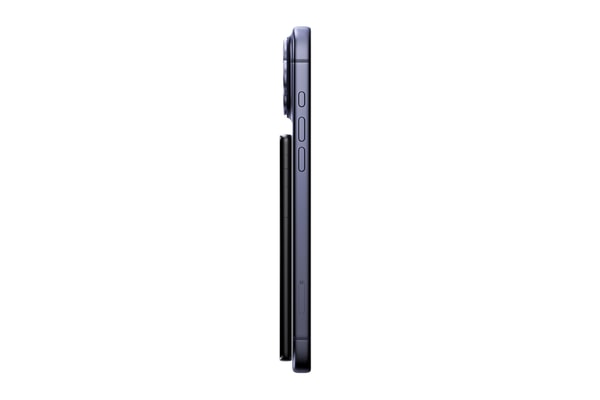 Xteink X4 Pro pocket e-reader with dual-tone frontlight attached magnetically to a smartphone