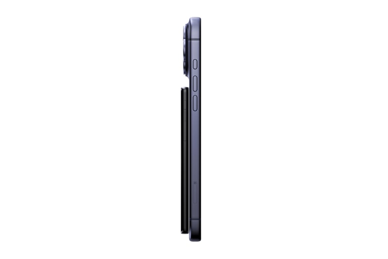 Xteink X4 Pro pocket e-reader with dual-tone frontlight attached magnetically to a smartphone