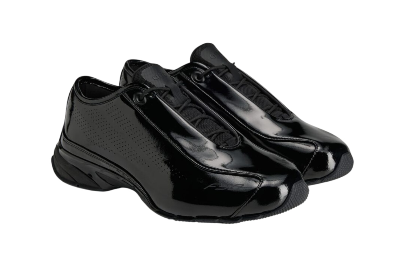 Arte Antwerp x adidas F50 Feather Patent Leather Black HQ3324 hero image showing glossy patent leather upper and tonal black sole