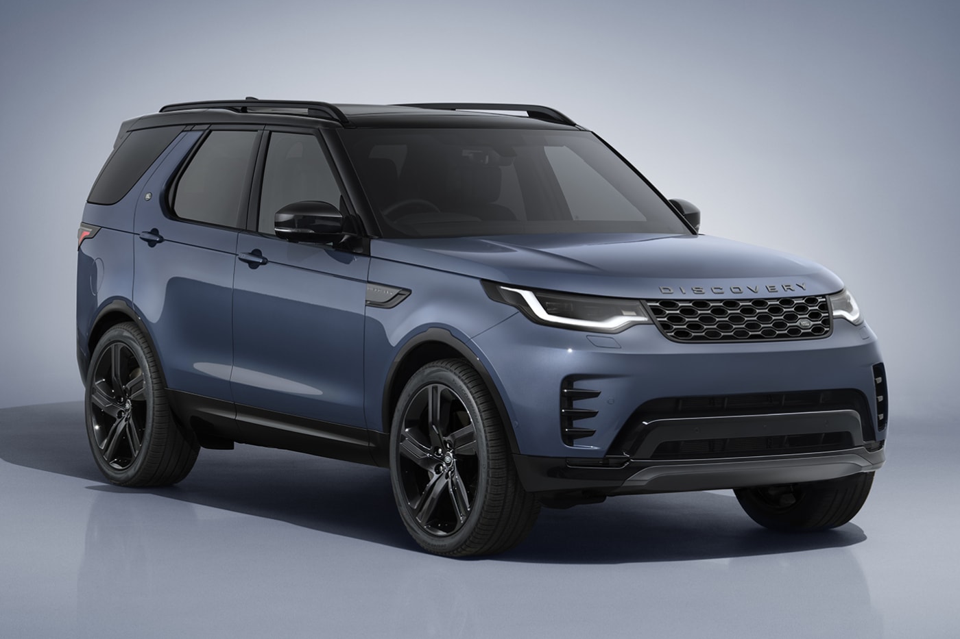 Land Rover Discovery Sport SUV alongside Range Rover Evoque at Halewood plant transition to EMA-based models