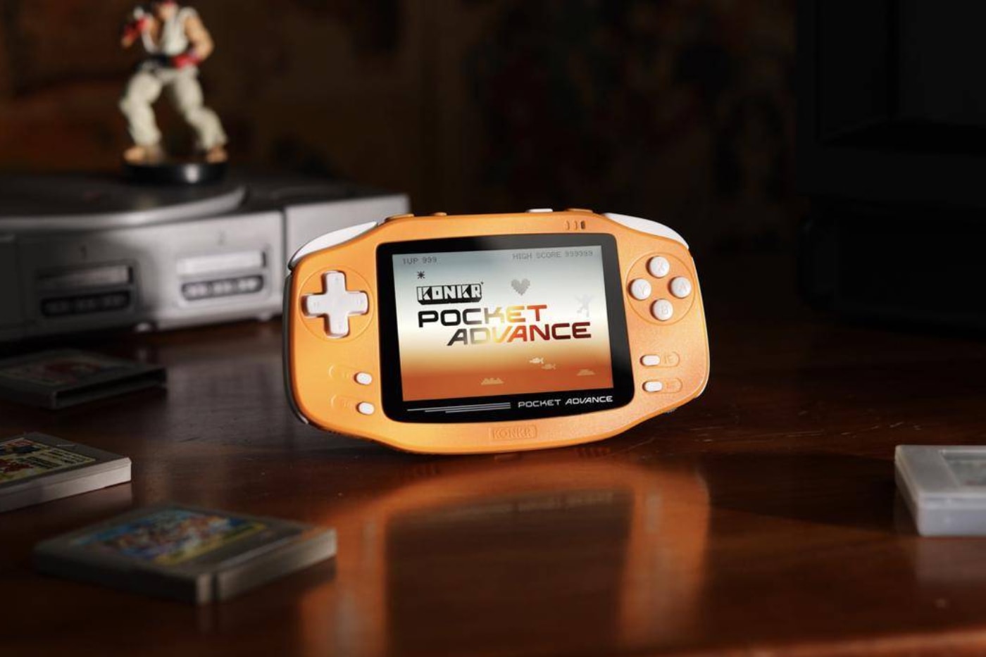 Ayaneo Konkr Pocket Advance handheld in navy blue and coral orange finishes