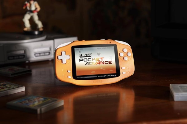 Ayaneo Konkr Pocket Advance handheld in navy blue and coral orange finishes