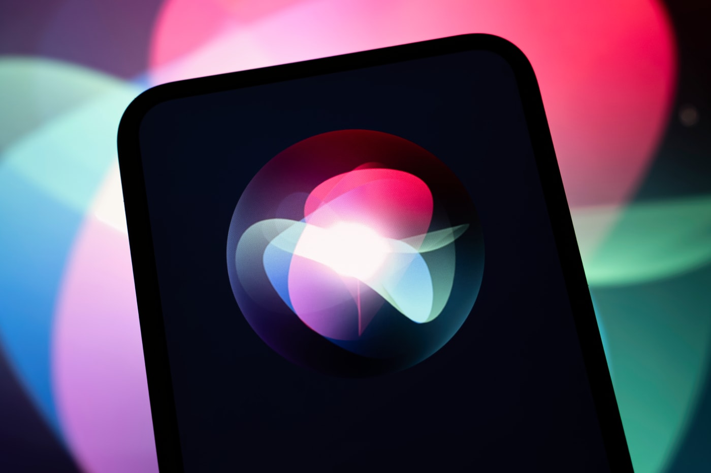 Apple Siri AI running across iPhone, iPad, Mac, Apple Watch, and Apple Vision Pro screens