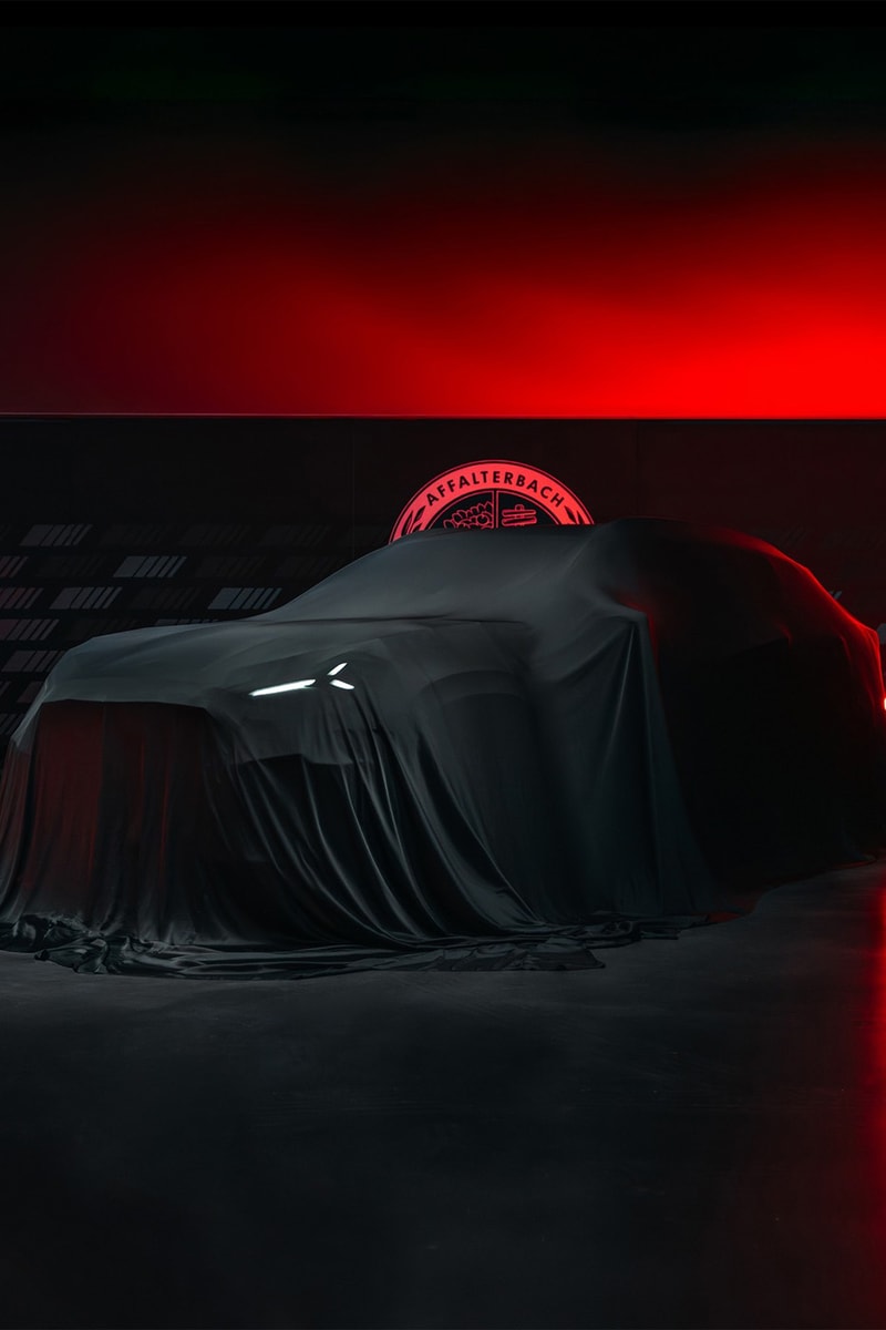 Mercedes-AMG GT 4-Door Coupe EV SUV teaser showing covered high-riding electric performance crossover silhouette