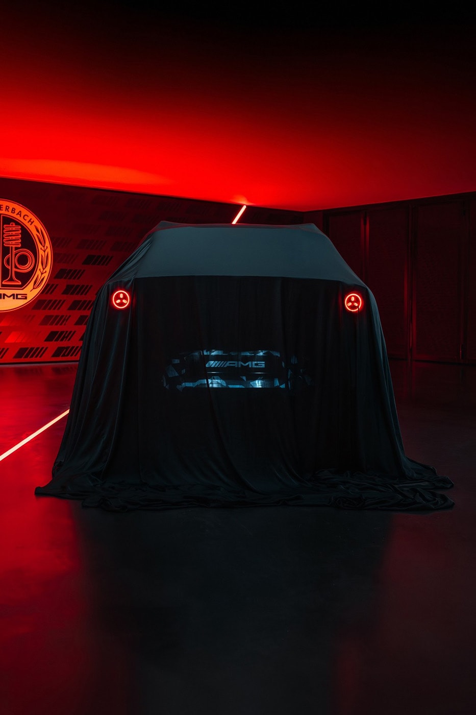 Mercedes-AMG GT 4-Door Coupe EV SUV teaser showing covered high-riding electric performance crossover silhouette