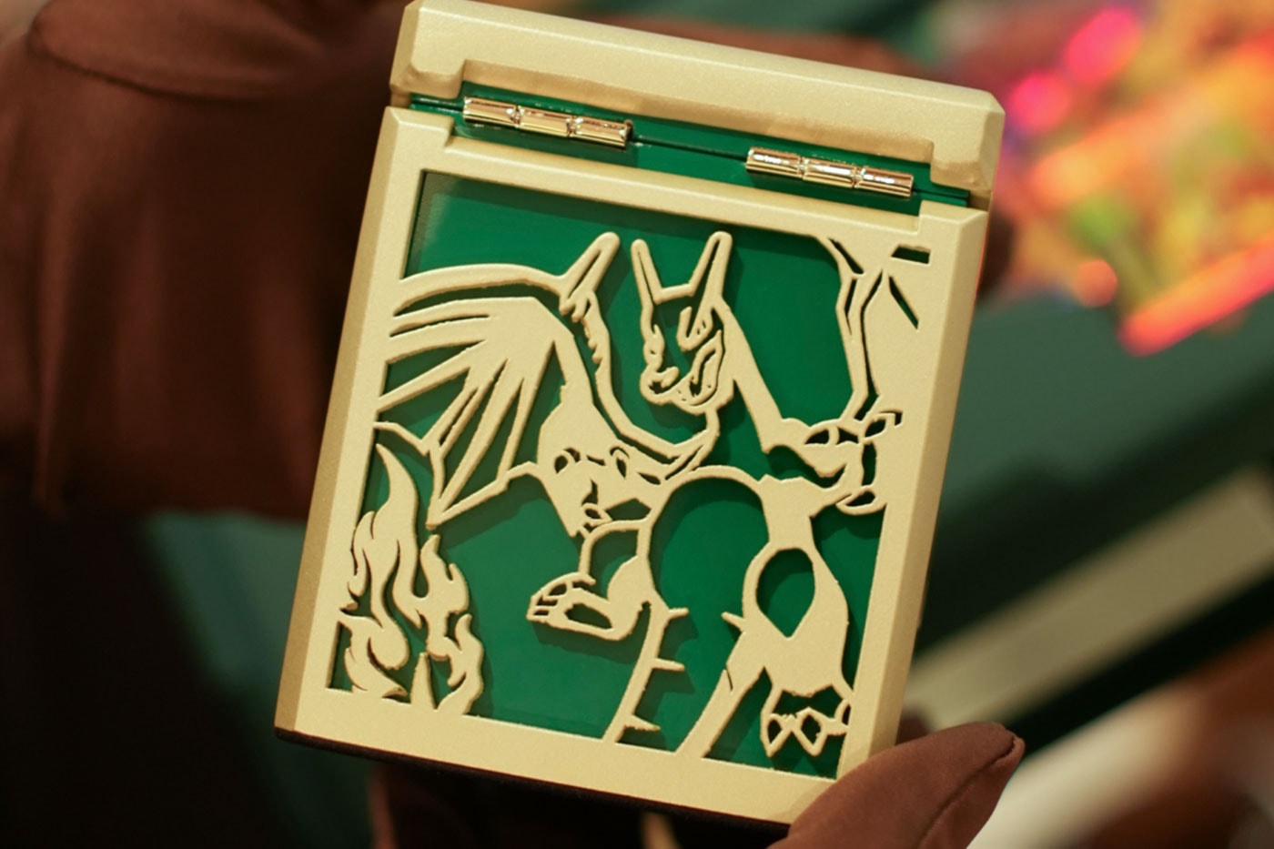 Artist Philip Gefaell Crafts Custom 18K Gold Ash Charizard Ring for Pokémon's 30th Anniversary