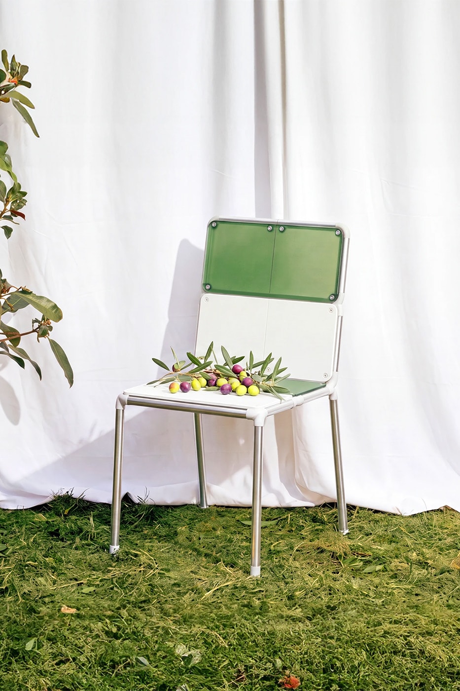 Junha Kahm Facade modular chair with stainless steel frame and interchangeable PETG panels displayed in different configurations