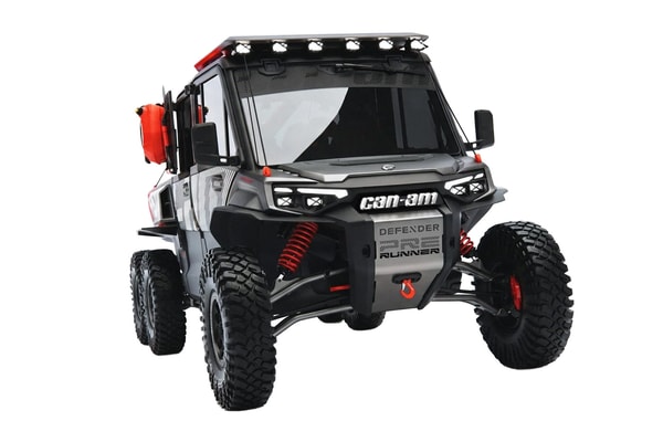 Can-Am Defender Prerunner and Maverick R XRay off-road concept vehicles displayed together at night