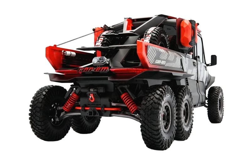 Can-Am Defender Prerunner and Maverick R XRay off-road concept vehicles displayed together at night
