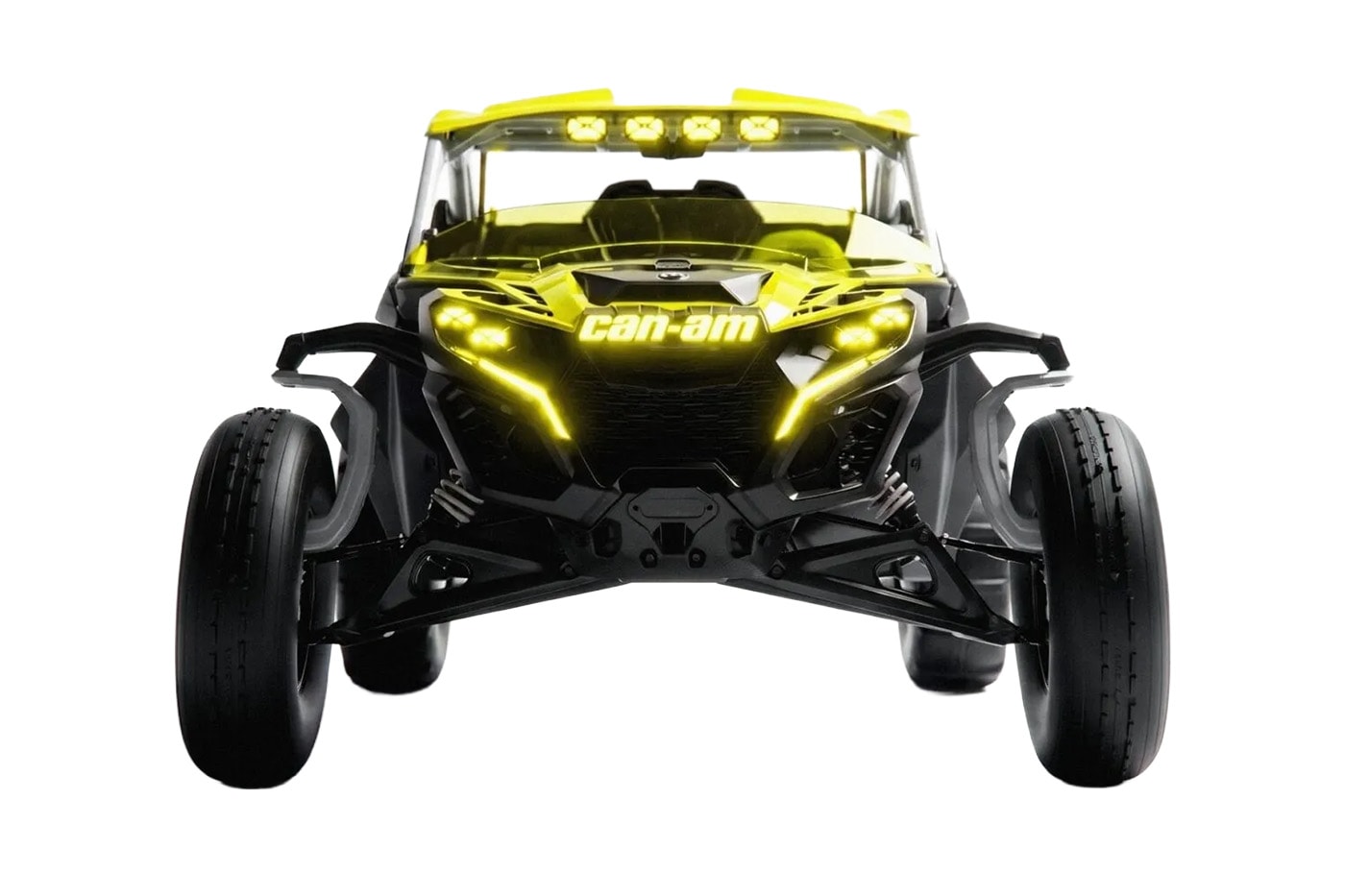 Can-Am Defender Prerunner and Maverick R XRay off-road concept vehicles displayed together at night