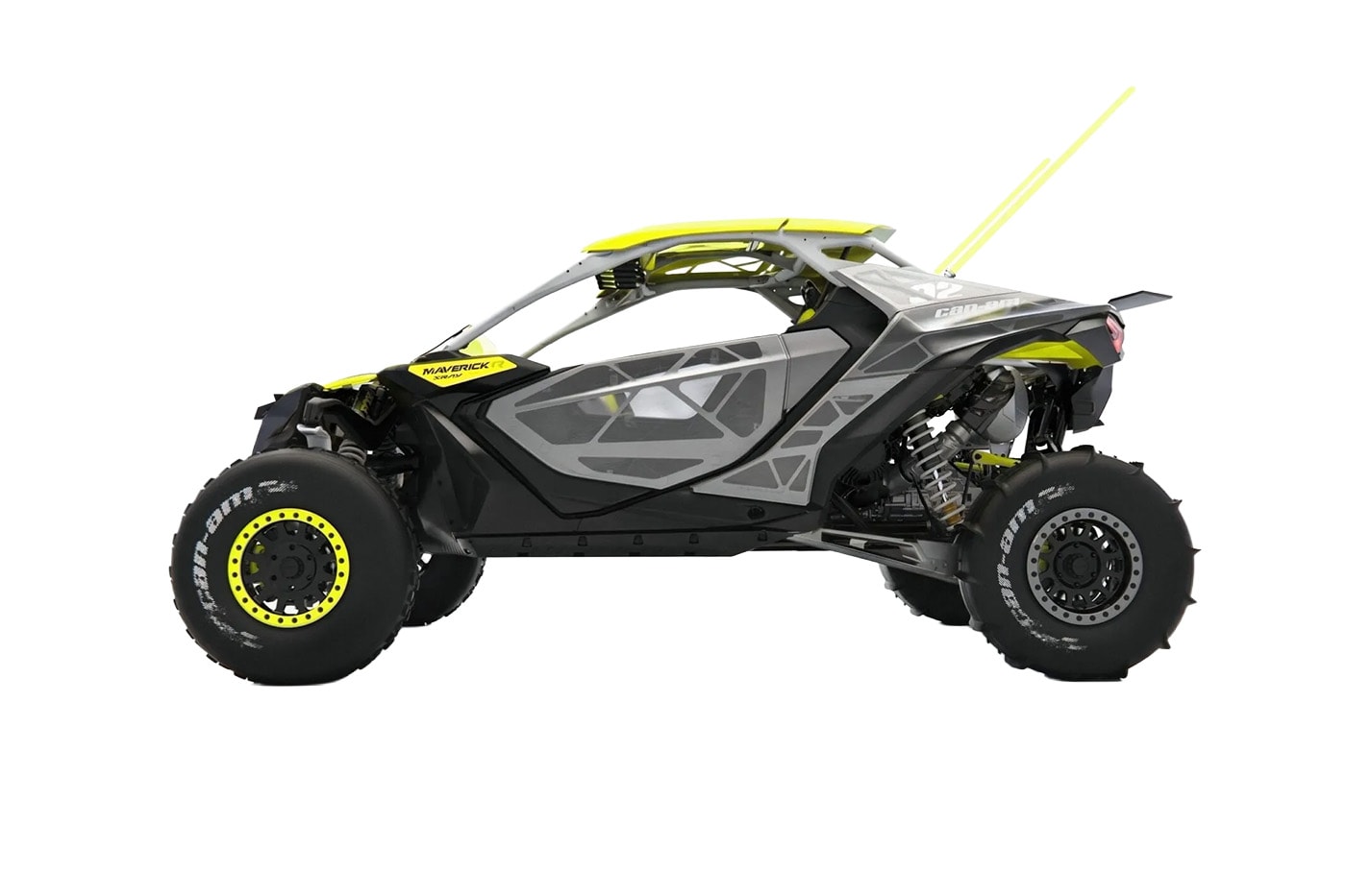 Can-Am Defender Prerunner and Maverick R XRay off-road concept vehicles displayed together at night