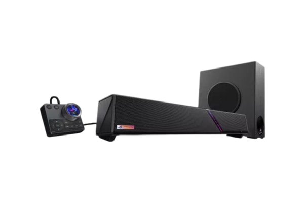 ASUS ROG Gjallar gaming soundbar with wireless subwoofer and control hub on a desktop setup