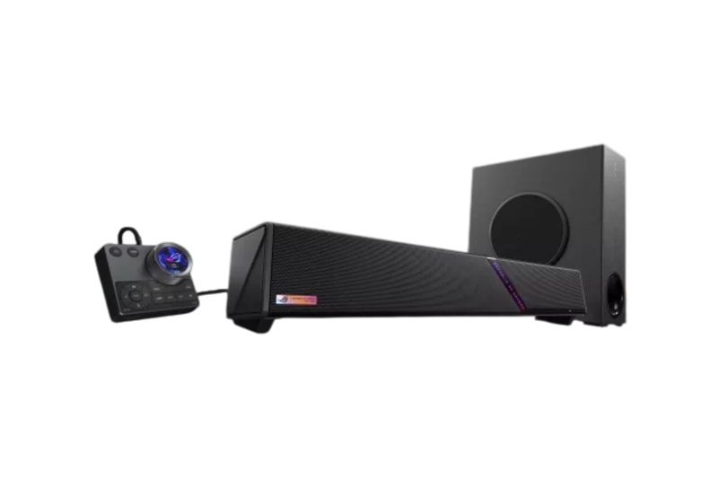 ASUS ROG Gjallar gaming soundbar with wireless subwoofer and control hub on a desktop setup