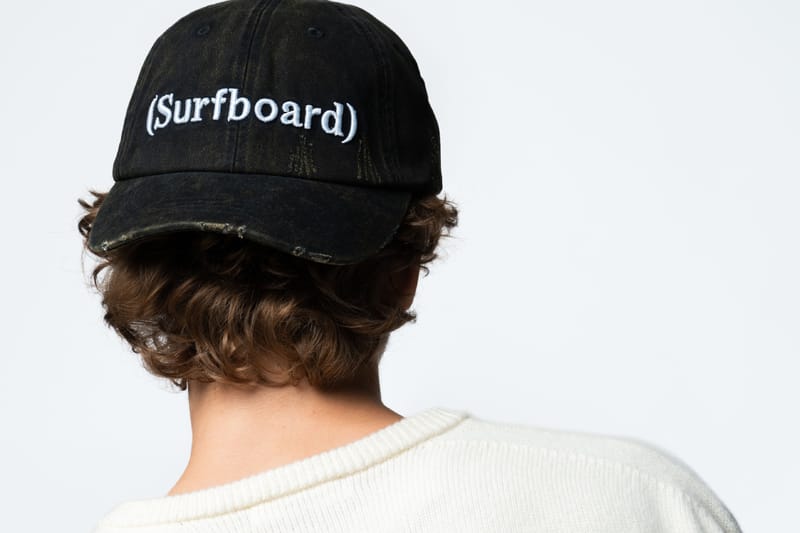Stockholm Surfboard Club and RHC Turn the Icon Tag Navy for the "Black Beach" Capsule