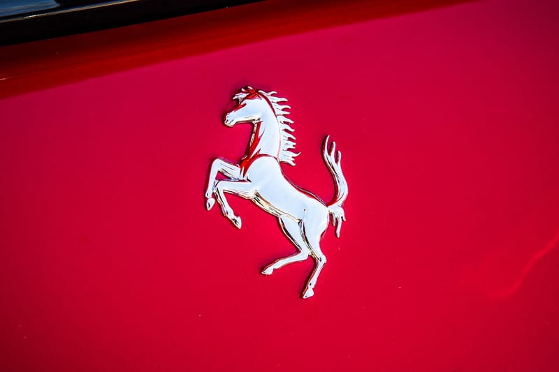 Ferrari Files Patent for Active Aerodynamic Taillights That Extend the Rear Wing on Demand