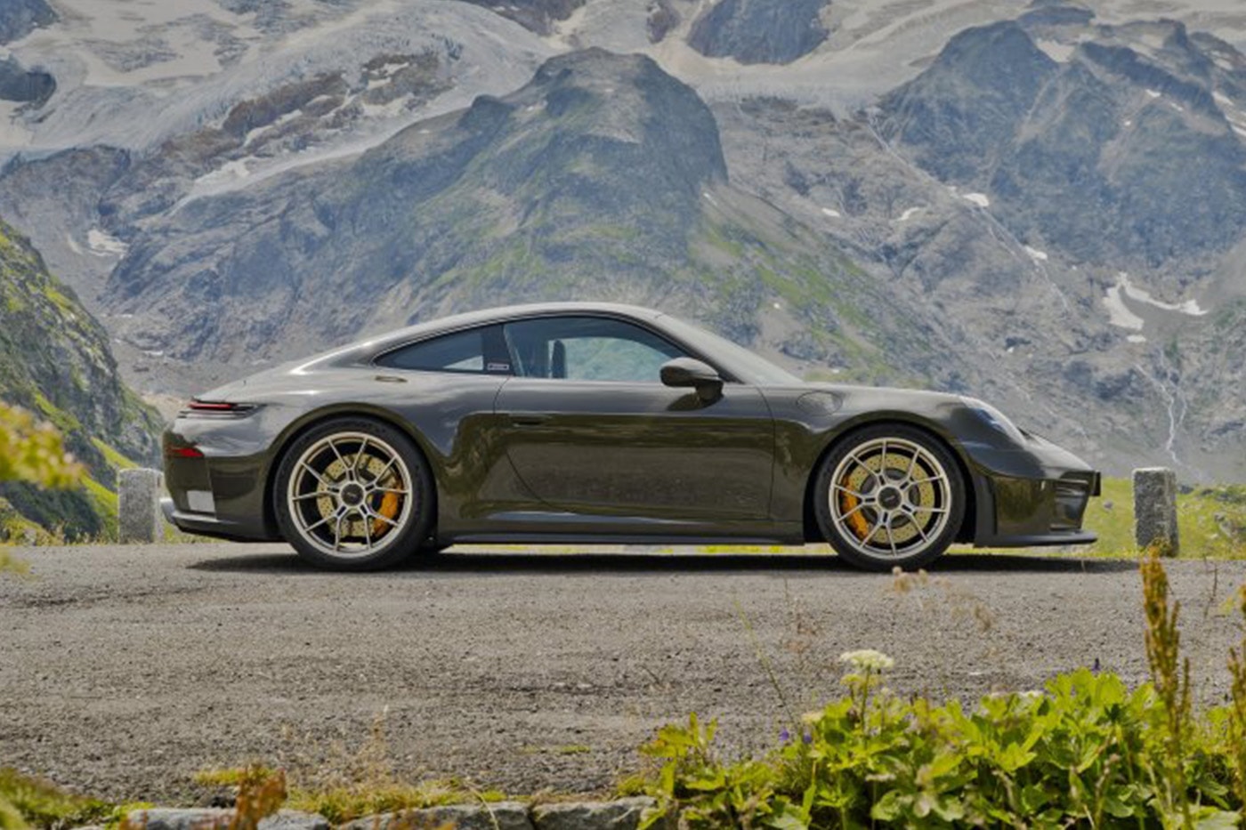 Porsche 911 GT3 Bergsport in Valleygreenmetallic with forged aluminum wheels on an Alpine road