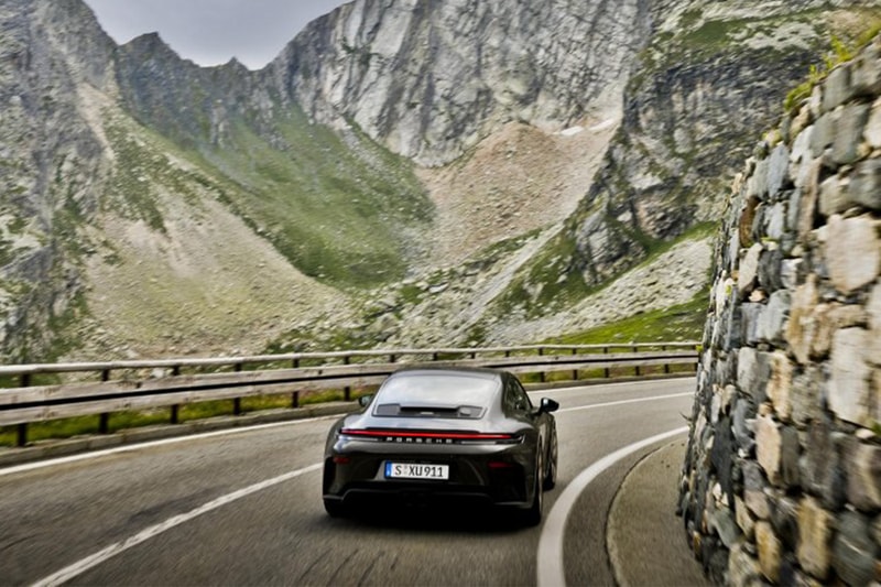 Porsche 911 GT3 Bergsport in Valleygreenmetallic with forged aluminum wheels on an Alpine road