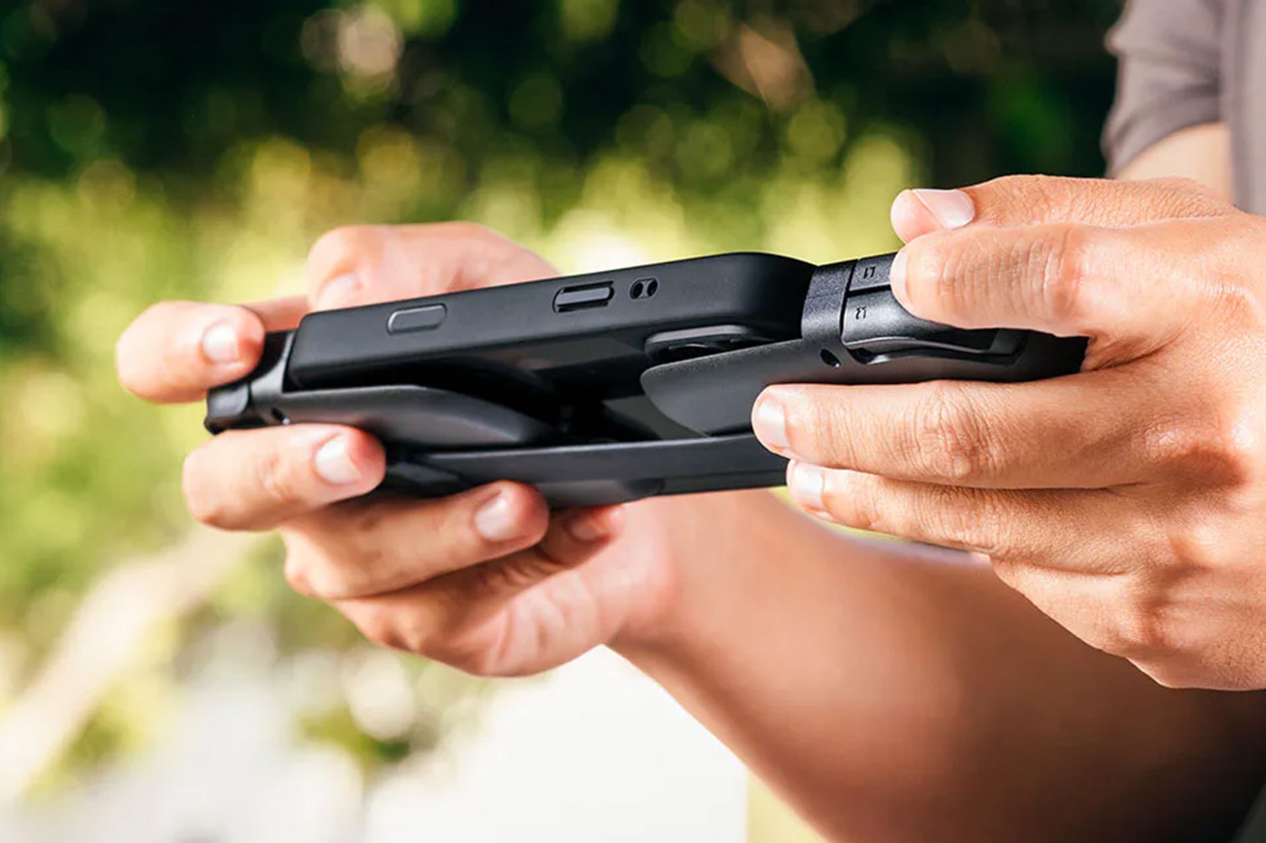 Razer Prio foldable mobile gaming controller attached to a smartphone via USB-C