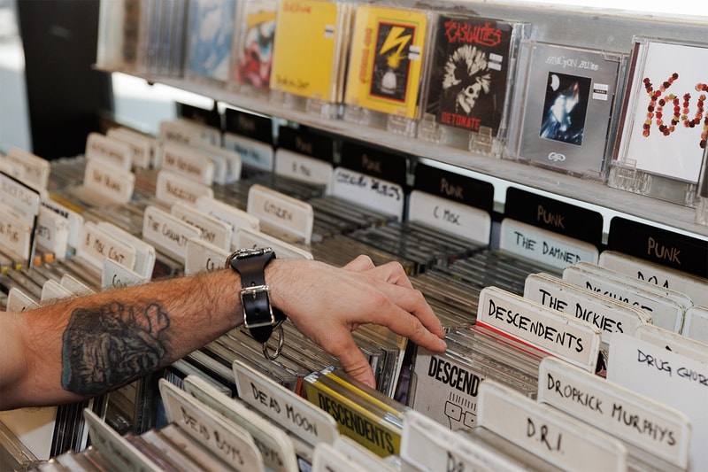 Gen Z fans holding K-Pop CD special editions amid 2026 CD sales surge