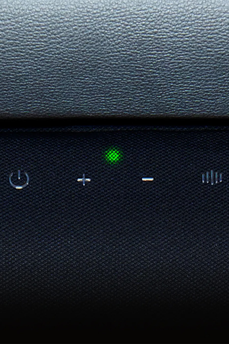 Razer Clio X wireless speaker head cushion mounted on a Razer gaming chair