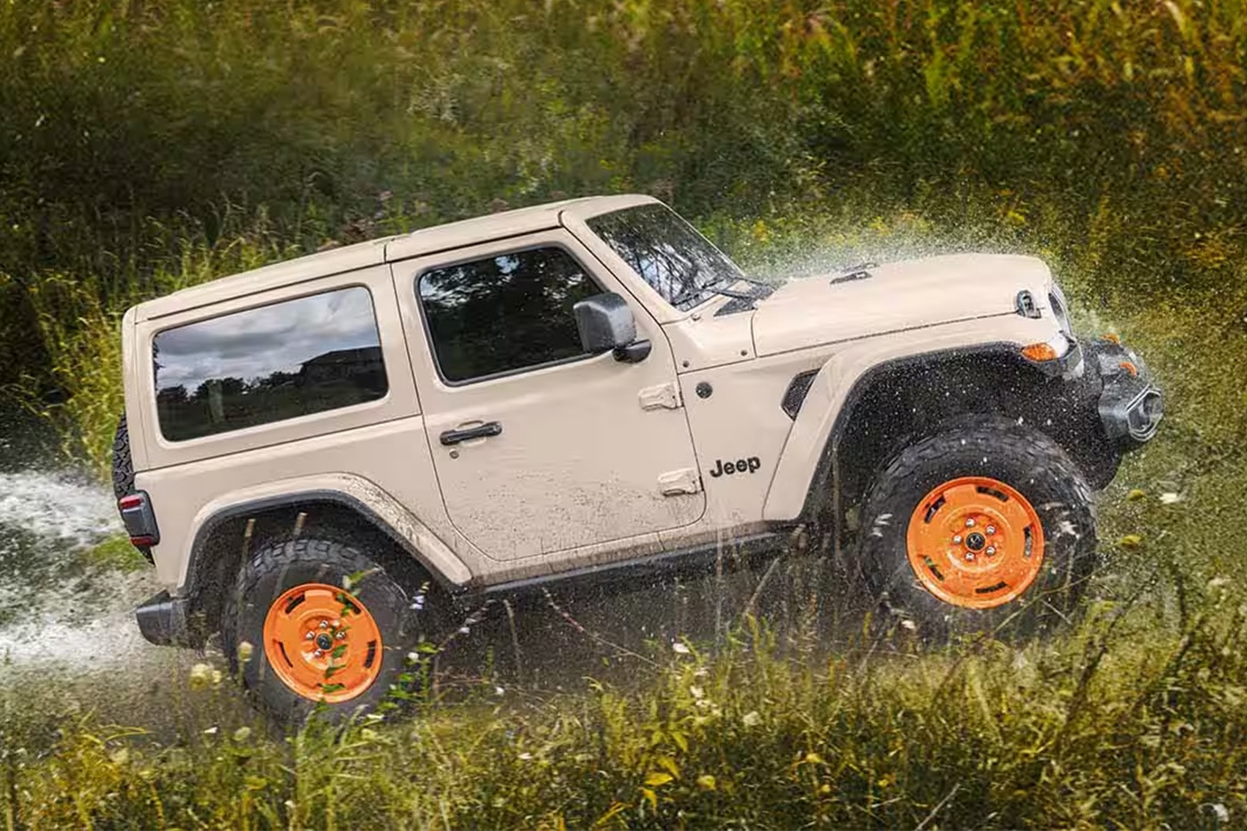 2027 Jeep Wrangler JL-2A two-door in Gobi paint with Joose-painted retro wheels and BFGoodrich KO2 all-terrain tires