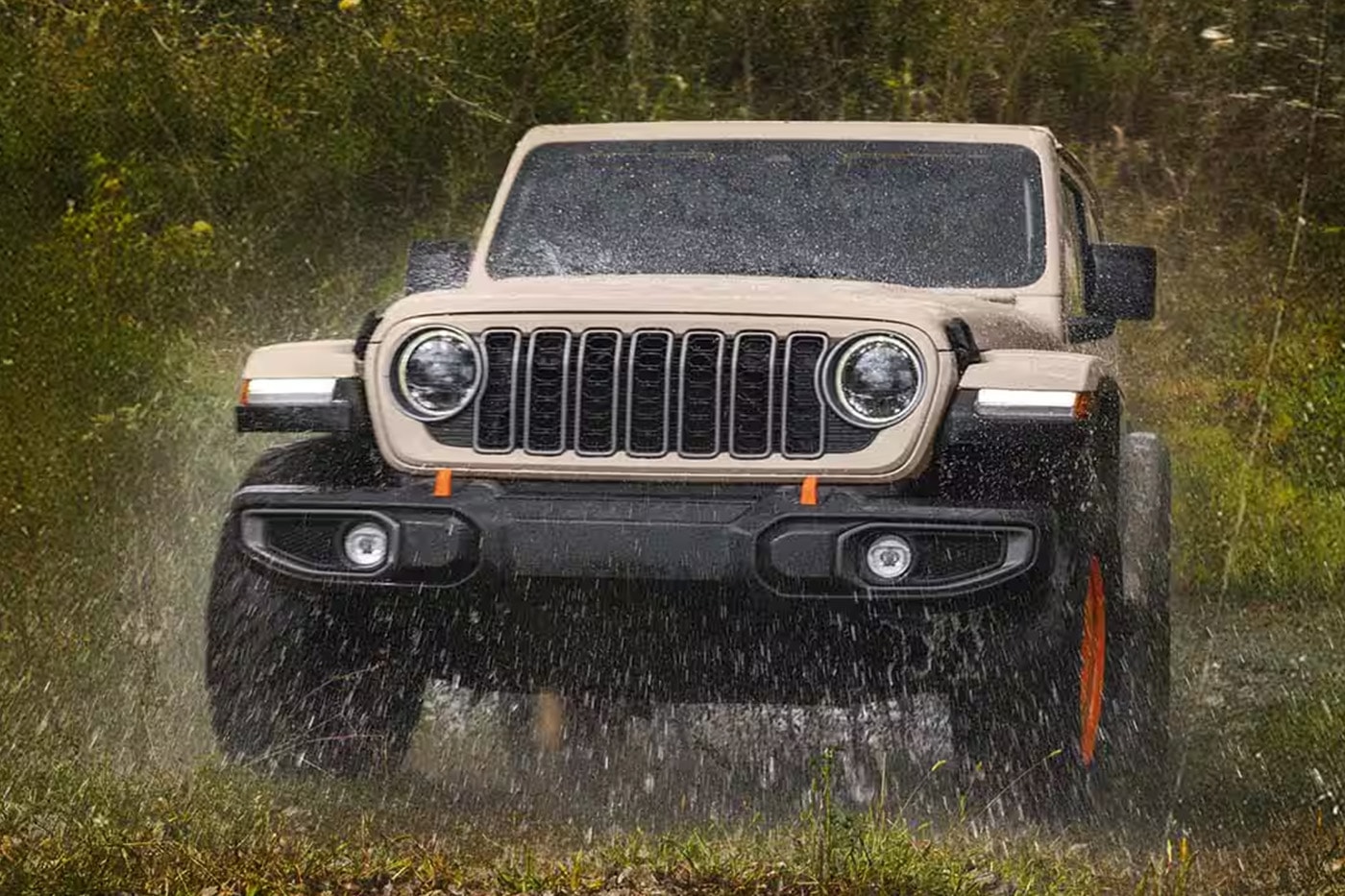 2027 Jeep Wrangler JL-2A two-door in Gobi paint with Joose-painted retro wheels and BFGoodrich KO2 all-terrain tires